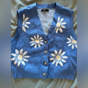 Blue and flowered vest
